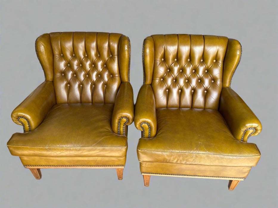 PAIR OF TUFTED LEATHE GOLDEN BROWN CHAIRS