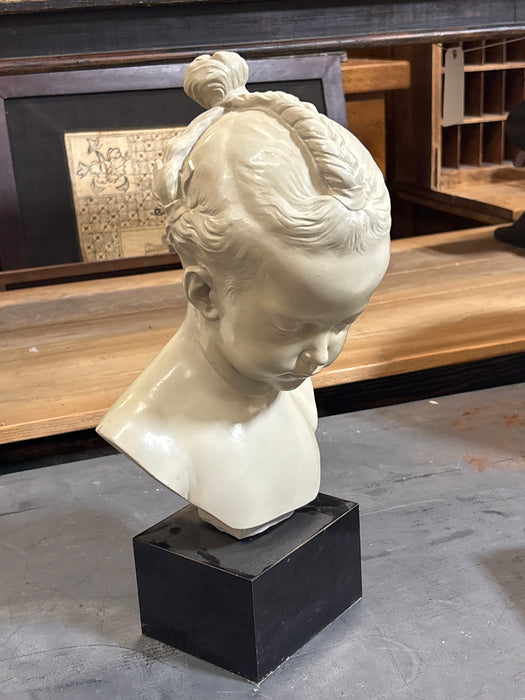 CHAULK BUST OF GIRL WITH BRAID BUN