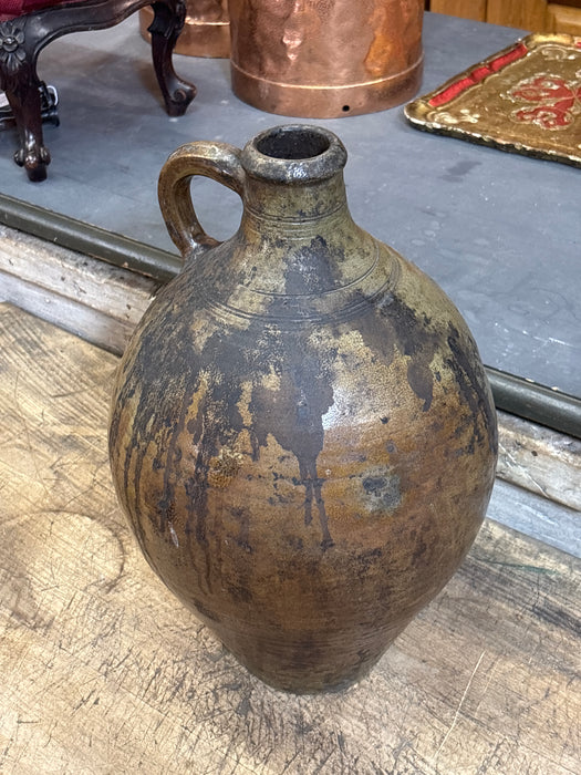 OVOID POTTERY JUG WITH HANDLE