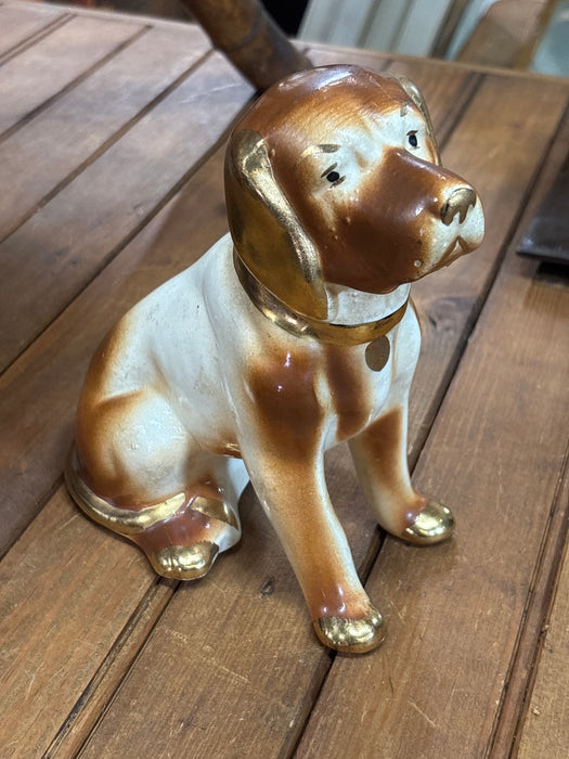 JUDGMENTAL PORCELAIN DOG FIGURINE