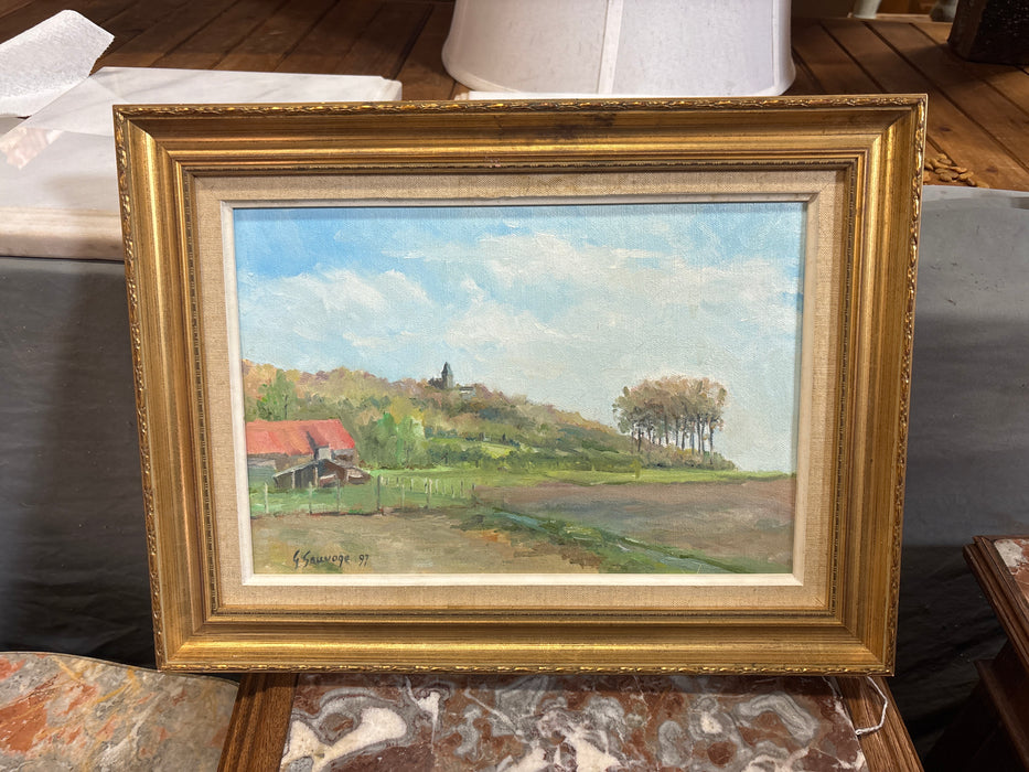 GOLD FRAMED OIL PAINTING OF RED HOUSE NEXT TO FIELD - SIGNED G. SAUVAGE