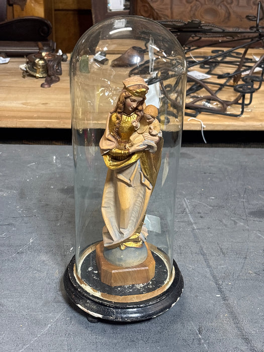 CARVED WOOD MADONNA AND CHILD IN DOME ATTACHED TO BLACK BASE