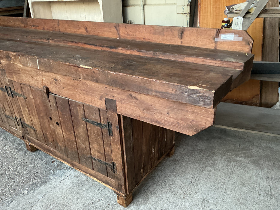 LARGE ANTIQUE WORKBENCH WITH 4 IRON STRAP HINGED DOORS