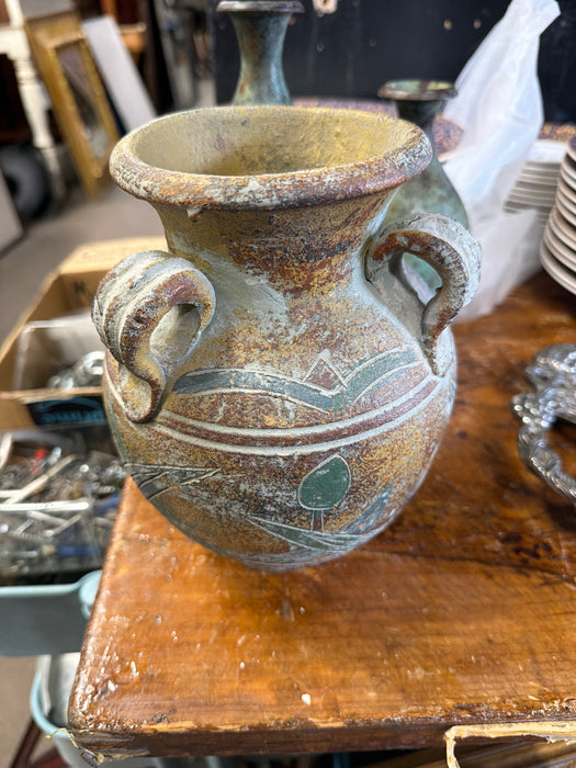 SMALL TRIHANDLED POTTERY JUG