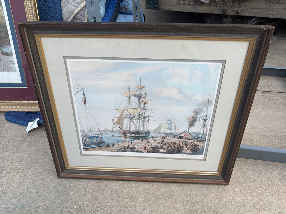 BROWN FRAMED SAILBOAT SCENE WITH AMERICAN FLAG - SIGNED ROY CROSS '83