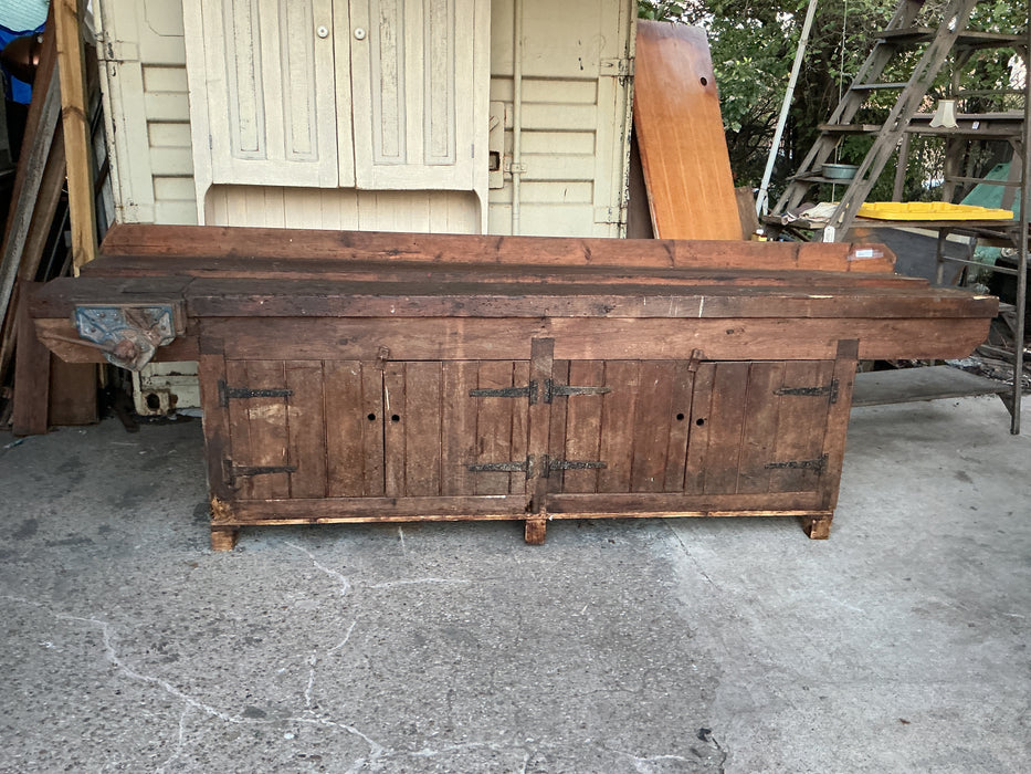 LARGE ANTIQUE WORKBENCH WITH 4 IRON STRAP HINGED DOORS