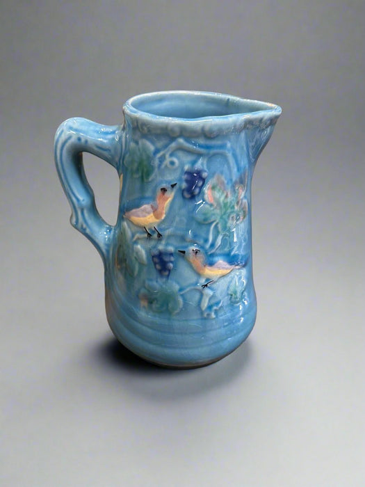 LIGHT BLUE BIRDS MAJOLICA PITCHER