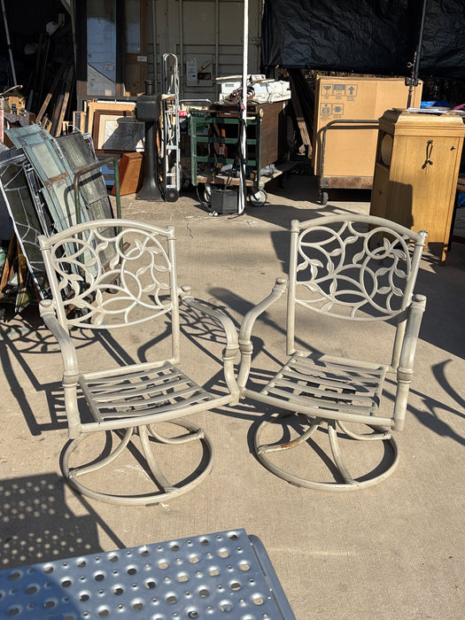 PAIR OF NOT OLD PATIO SWIVEL CHAIRS