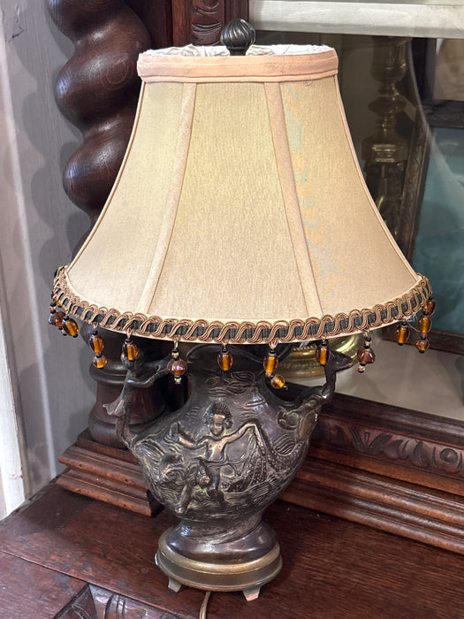 BRONZE LAMP OF CHILDREN RAISING EARTH AND SEA