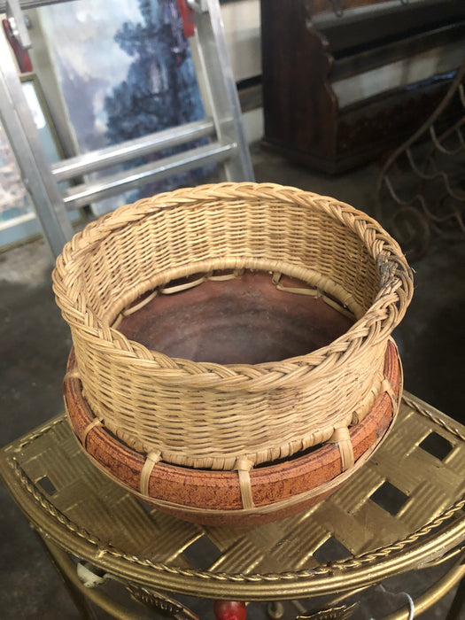 SMALL ORANGE AND WICKER PLANTER