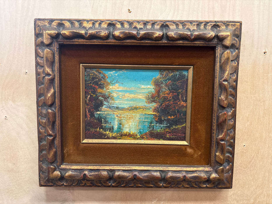 SMALL ORNATE GOLD FRAMED LANDSCAPE OIL PAINTING OF LAKE THROUGH TREES - SIGNED