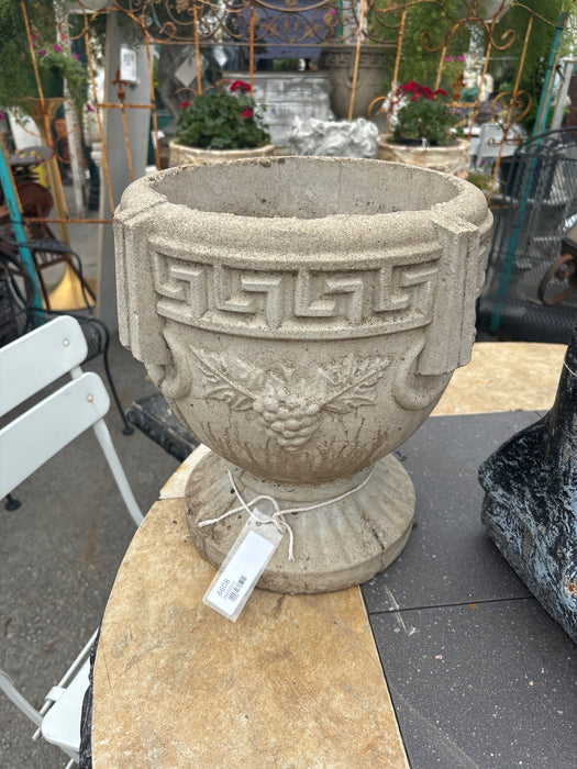 PAIR OF CONCRETE GRAPE PLANTERS