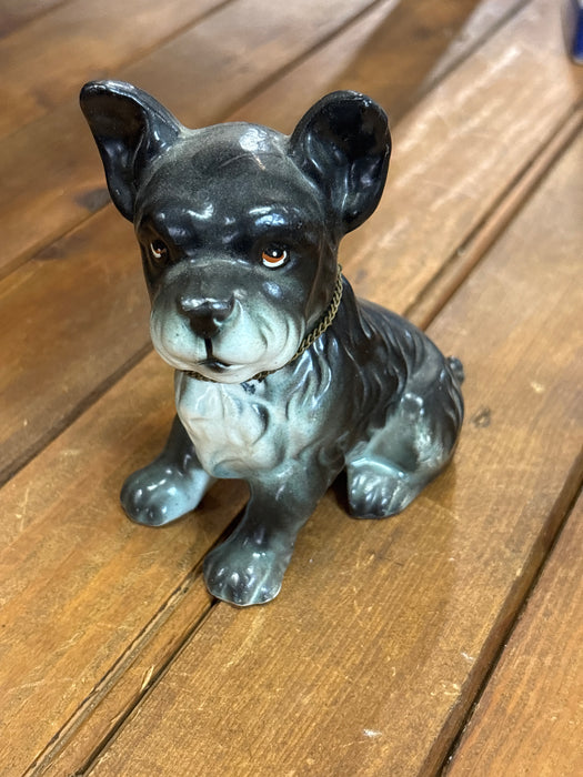 SMALL BLACK PORCELAIN BLACK AND WHITE DOG FIGURINE