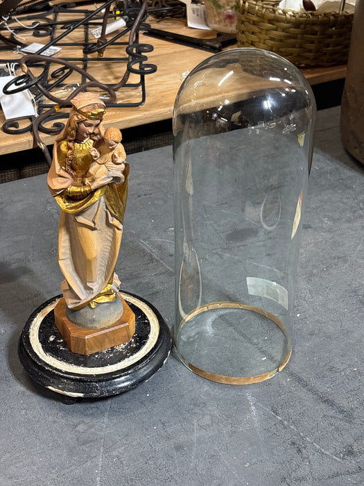 CARVED WOOD MADONNA AND CHILD IN DOME ATTACHED TO BLACK BASE