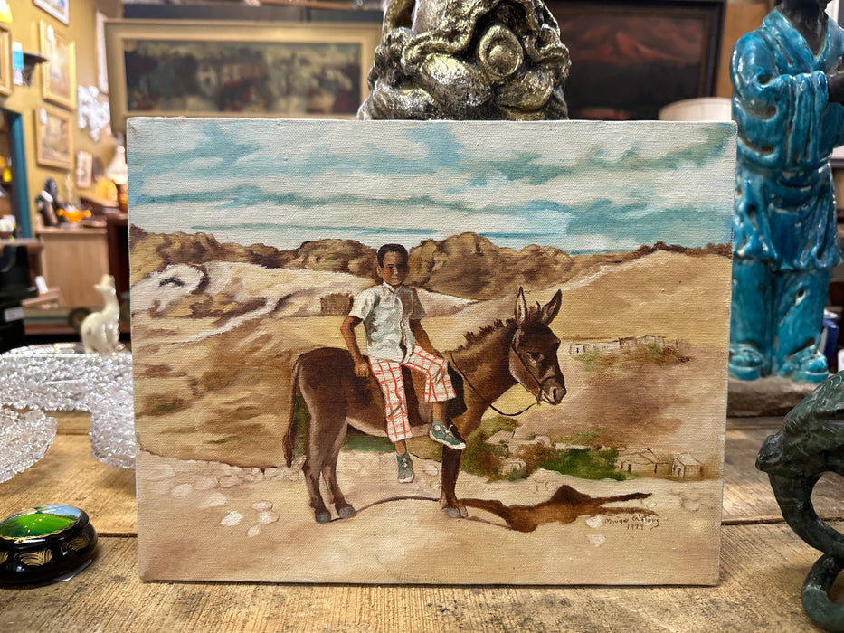 SMALL BLACKED FRAMED OIL P PAINTING OF A BOY ON A DONKEY BY MAUDE WATERS