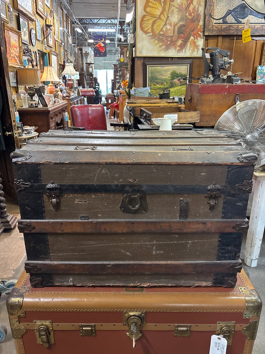 METAL SHIPPING TRUNK WITH WOOD STRAPS AND FLORAL LINED INTERIOR