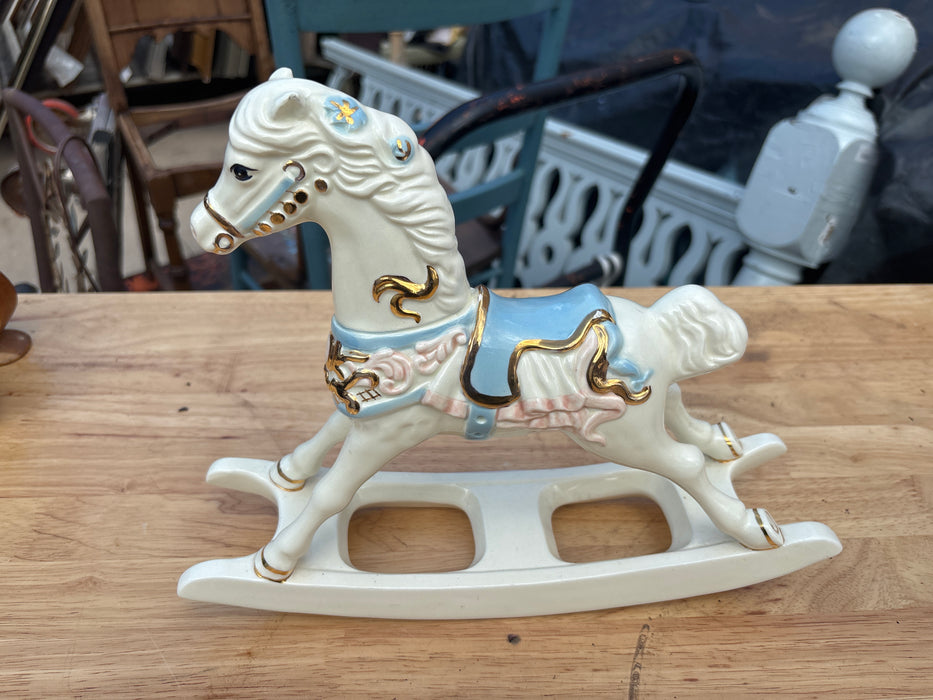 SMALL LIGHT BLUE AND PINK PORCELAIN ROCKING HORSE
