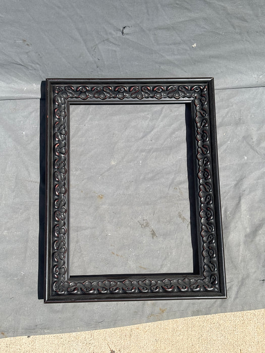 SMALL BLACK FRAME WITH MOLDED CARVING