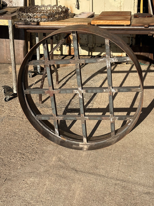 LARGE IRON WHEEL WITH CENTER GRID