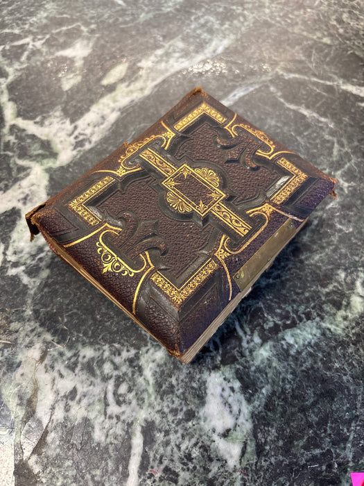 SMALL EARLY EMBOSSED PHOTO ALBUM WITH AS FOUND BINDING