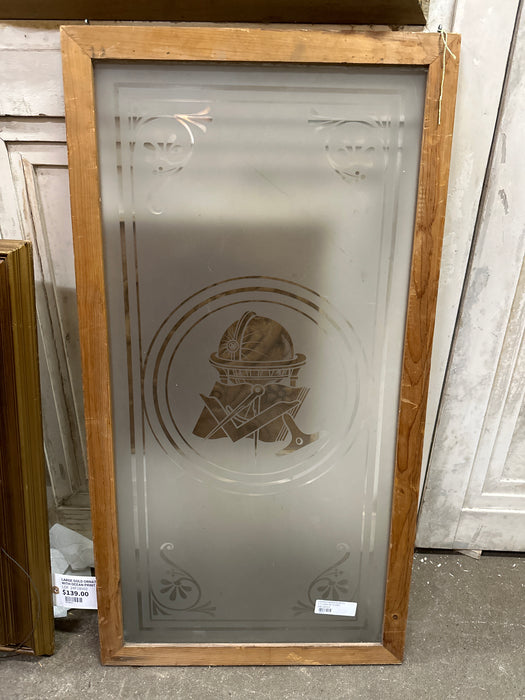 FRAMED WINDOW WITH ETCHING OF GLOBE