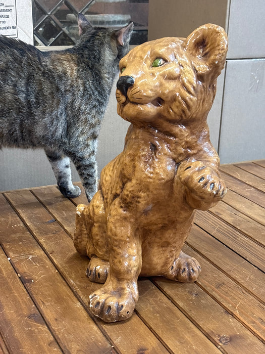 LION CUB STATUE WITH GREEN EYES