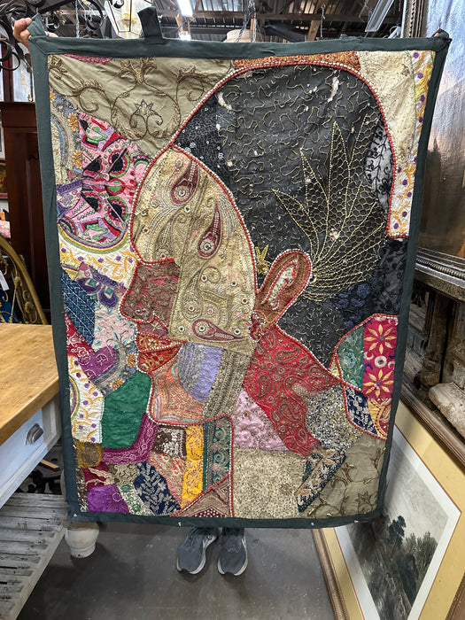 LARGE TEXTILE DEPICTING A WOMAN'S FACE