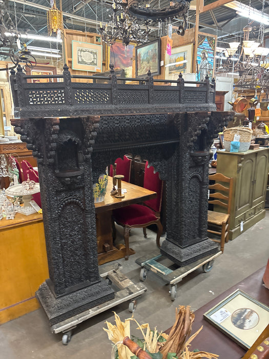 HIGHLY CARVED INDIAN MANTLE WITH FRETWORK CROWN