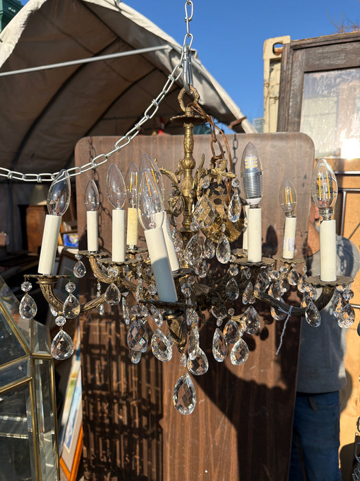 CRYSTAL PRISM AND BRASS CHANDELIER
