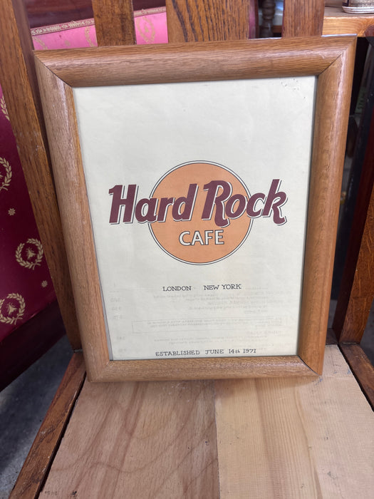 SMALL FRAMED PICTURE OF HARD ROCK CAFE LOGO AND INVERTED MENU