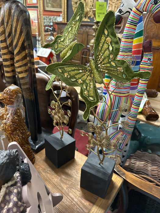 PAIR OF SCROLLY BUTTERFLY SCULPTURES