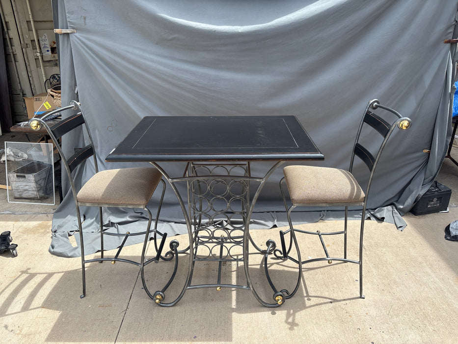 SET OF WOOD TOP BAR HEIGHT IRON BASE TABLE WITH WINE RACK AND PAIR OF IRON BARSTOOLS