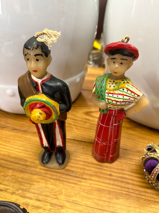 PAIR OF GUATEMALAN FIGURAL CANDLES