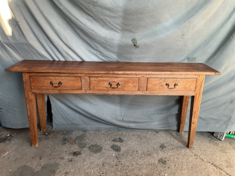 LONG PEGGED OAK CONSOLE WITH 3 DRAWERS AND TAPERED LEGS