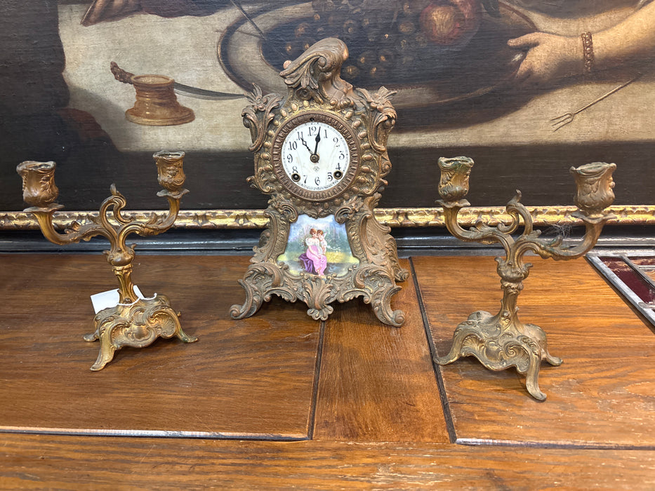 3 PIECE CHERUB PORTRAIT CLOCK SET WITH PAIR OF CANDELABRAS