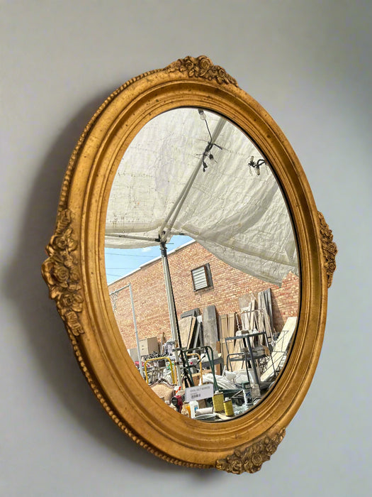 OVAL GILT MIRROR