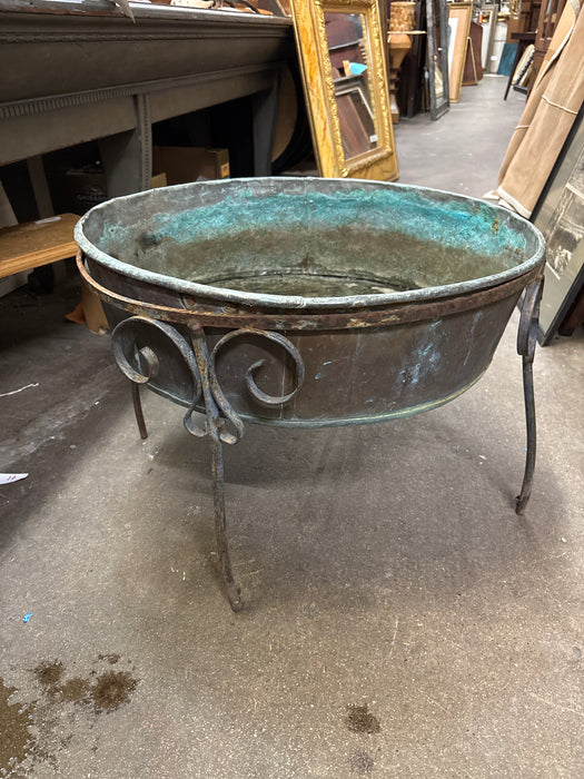 LARGE COPPER PLANTER WITH IRON LEGS