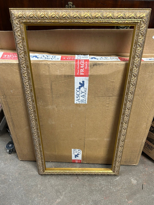 SMALL ORNATE GILT FRAME