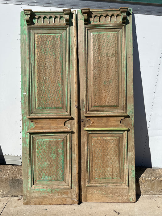 PAIR OF GREEN DIAMOND CARVED PINE DOORS