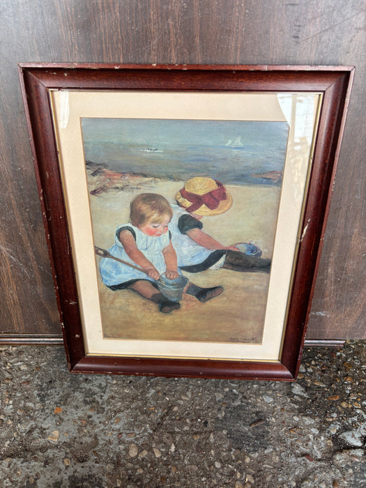 SOLD - SMALL WOOD FRAMED RENOIR PRINT OF GIRLS PLAYING IN BEACH SAND