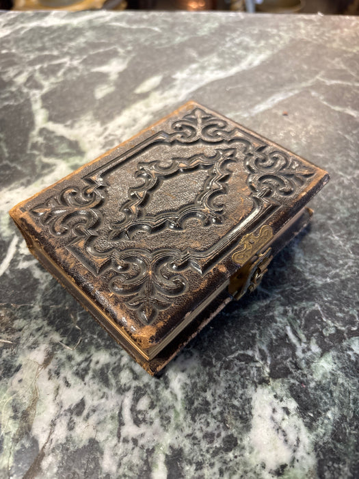 SMALL EARLY EMBOSSED LEATHER PHOTO ALBUM