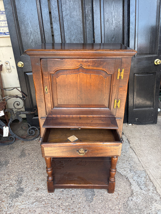NARROW DARK OAK CABINET ON LEGS WITH PULL OUT