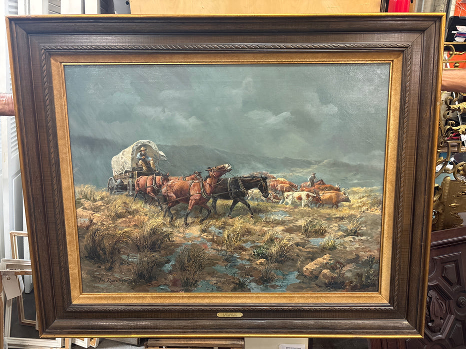 HUGE BROWN FRAMED WESTERN SCENE OF COVERED WAGON “A WET WINDY DAY” - SIGNED JOE RADER ROBERTS