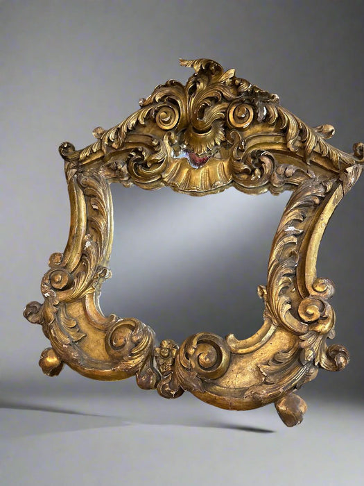 LOUIS XVI SHAPED GILT MIRROR