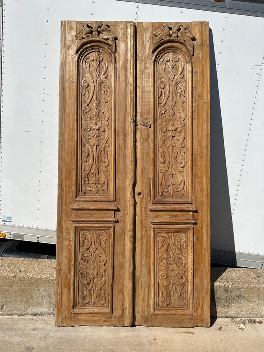 PAIR OF TALL FLORAL CARVED PINE DOORS