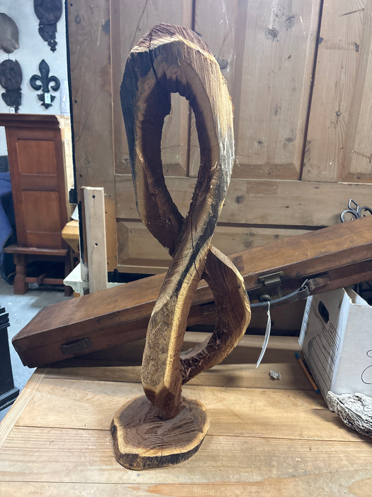 CHAINSAW CARVED WOOD FIGURE 8