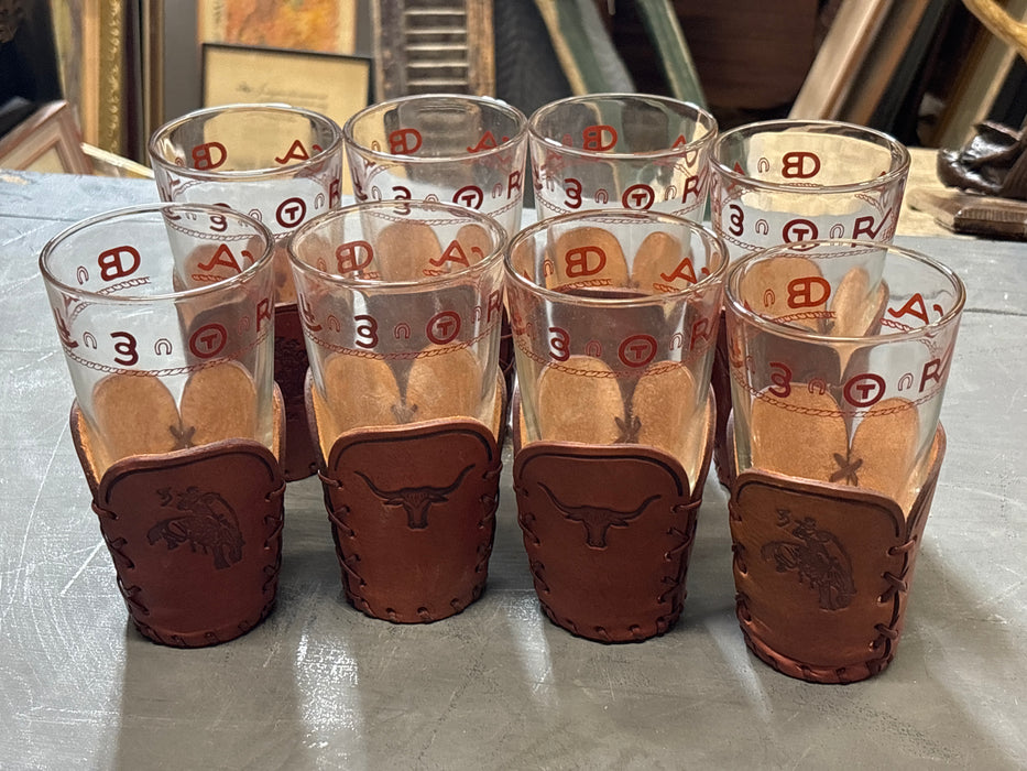 SET OF 8 MID CENTURY GLASSES WITH BRANDING SYMBOLS AND LEATHER HOLDERS