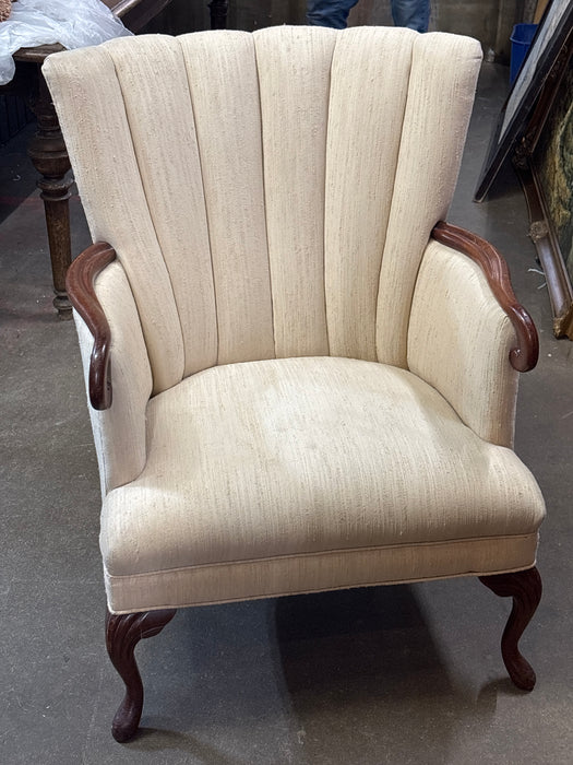 WHITE UPHOLSTERED SHELL BACK ARMCHAIR