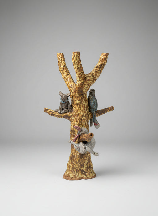 TREE WITH PERFROMERS POTTERY SNAKE