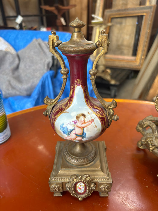 3 PIECE BRASS AND RED PORCELAIN GARNITURE CLOCK SET WITH CHERUBS